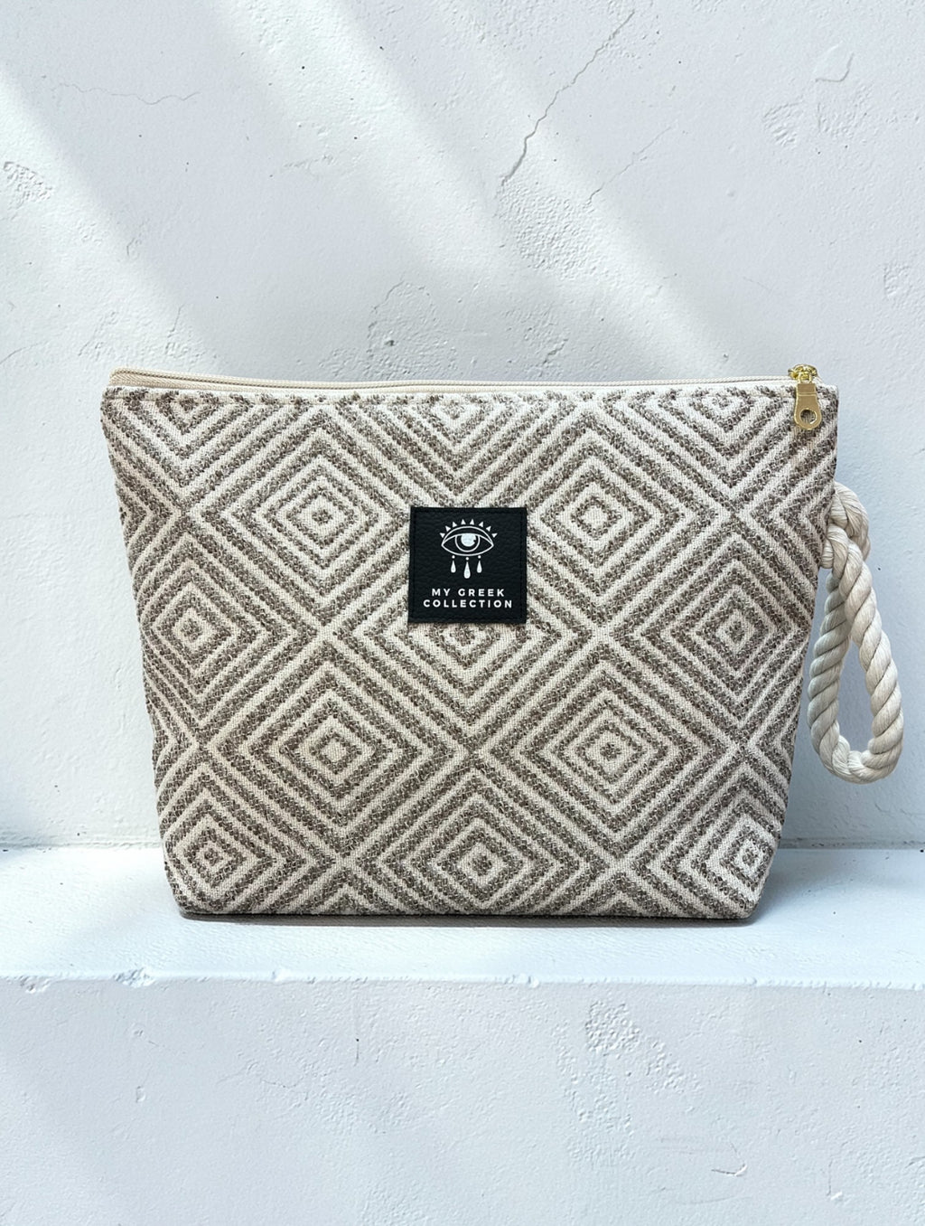 Artemis / Beige pouch bag