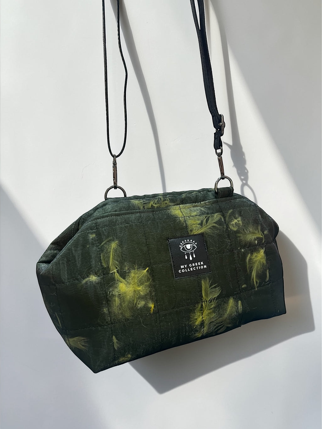 Thalia / True feather medium clutch