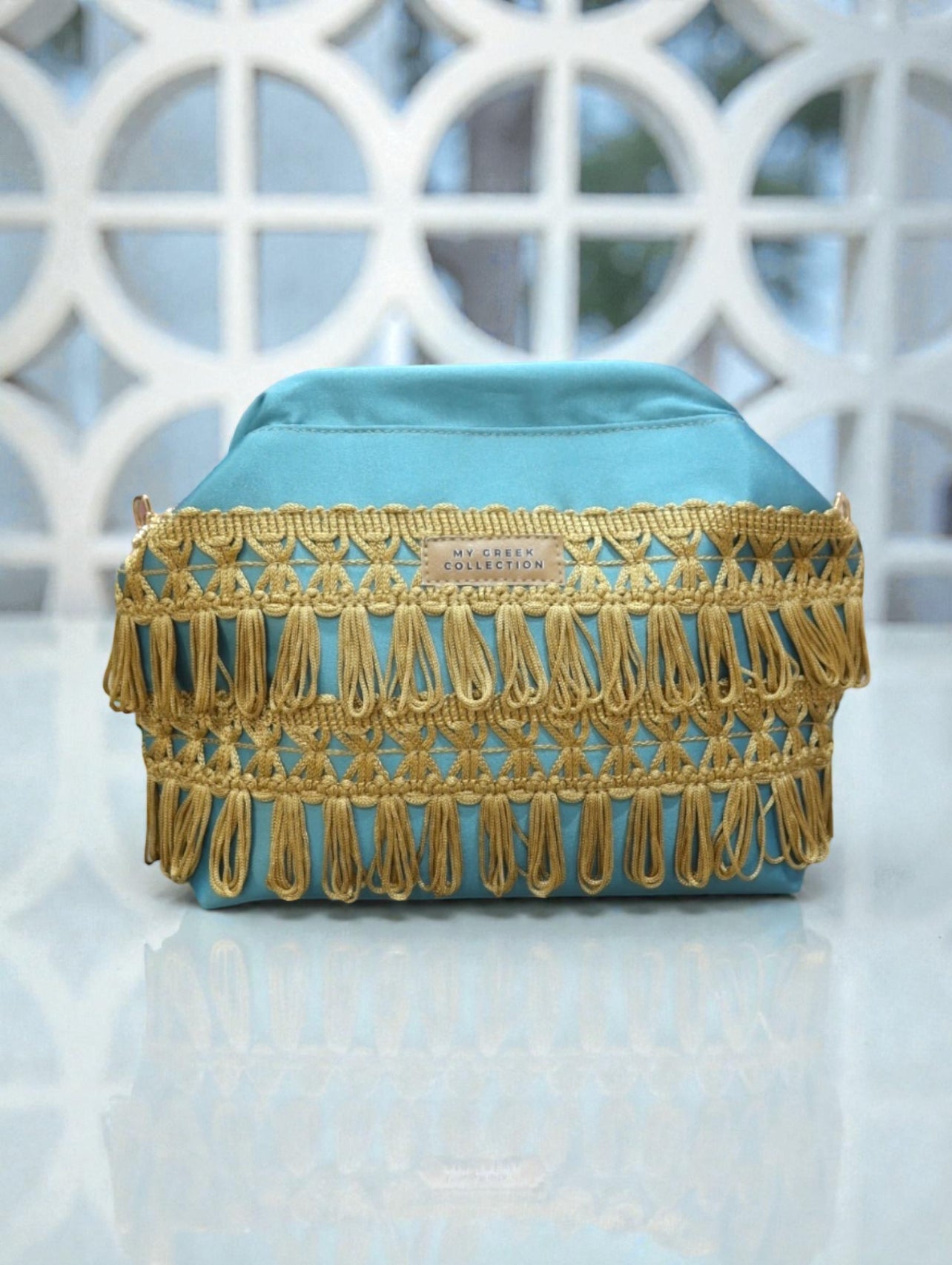 Fedra / small clutch aqua with fringes