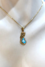 Κολιέ μενταγιόν σε χρυσό χρώμα και ματάκι