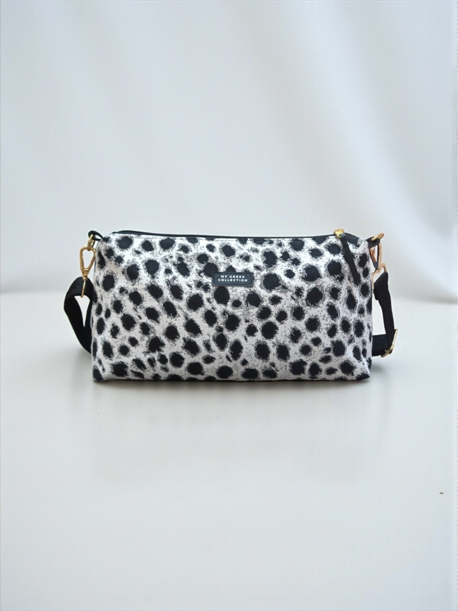 Kallia / abstract animal print baguette bag