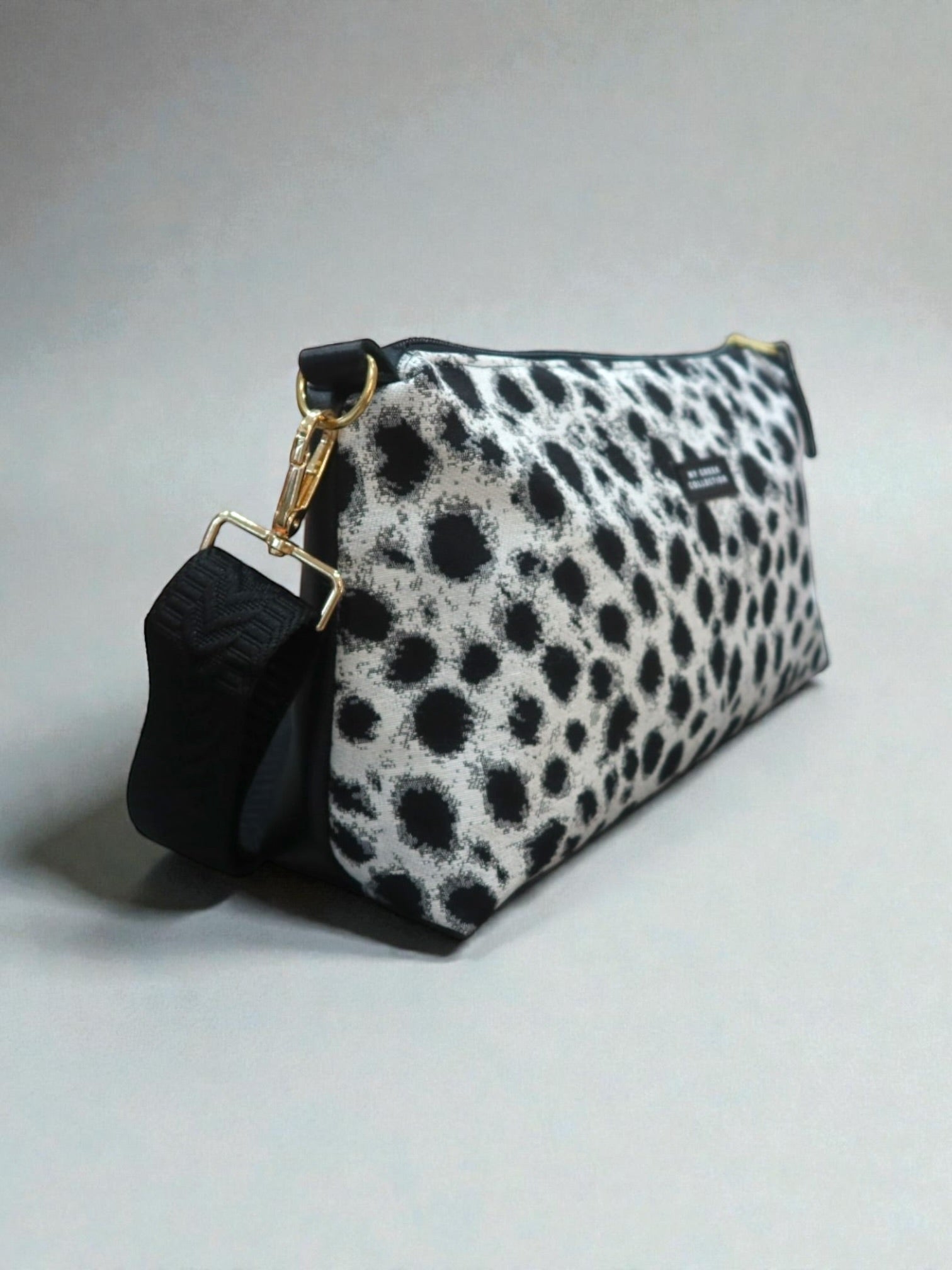 Kallia / abstract animal print baguette bag