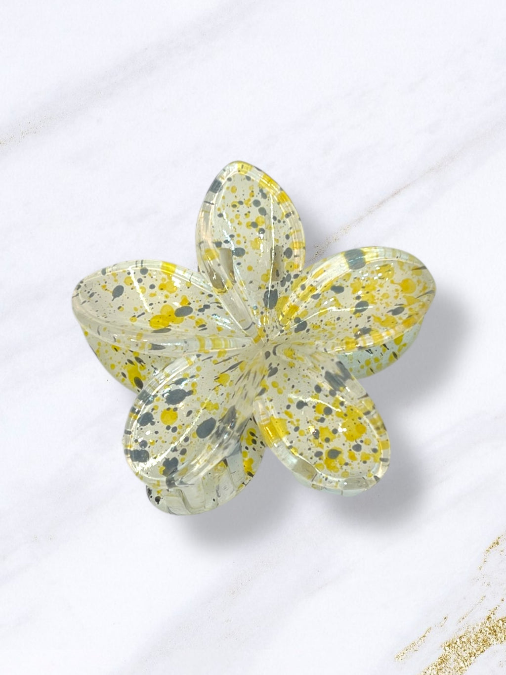 Κλάμερ λουλούδι λευκό κίτρινο πιτσιλιές